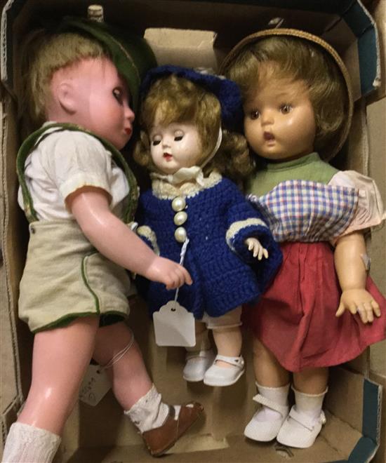 Two German costume dolls and a composition doll